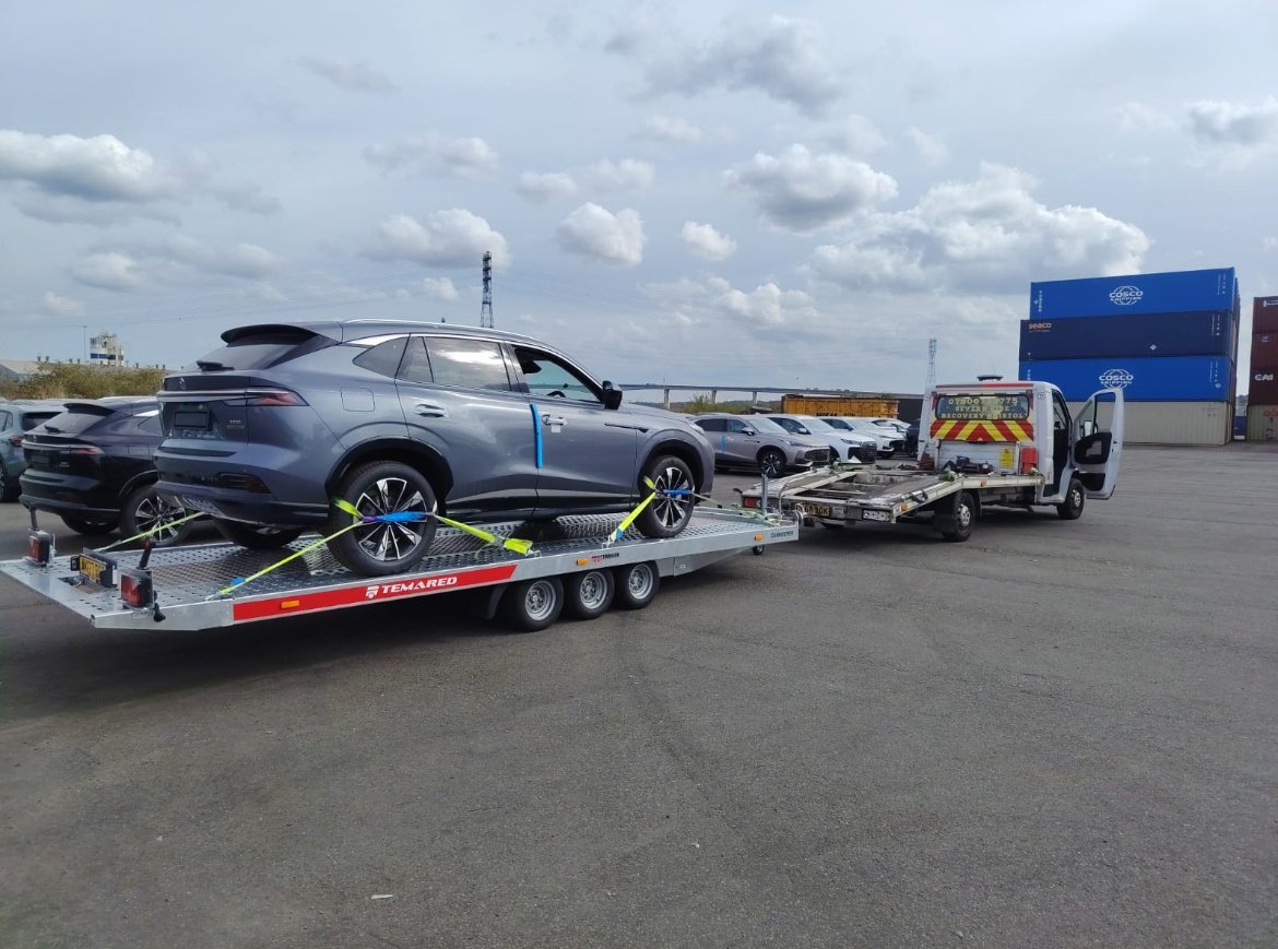 SUV secured on our car transporter trailer
